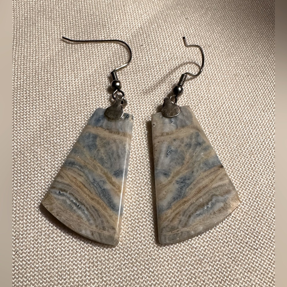 Sterling silver marked and unique natural stone in blues and cream colors.